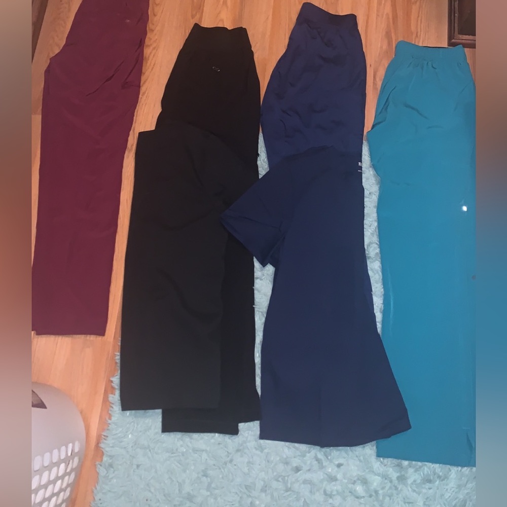 scrub pants and black and blue top only